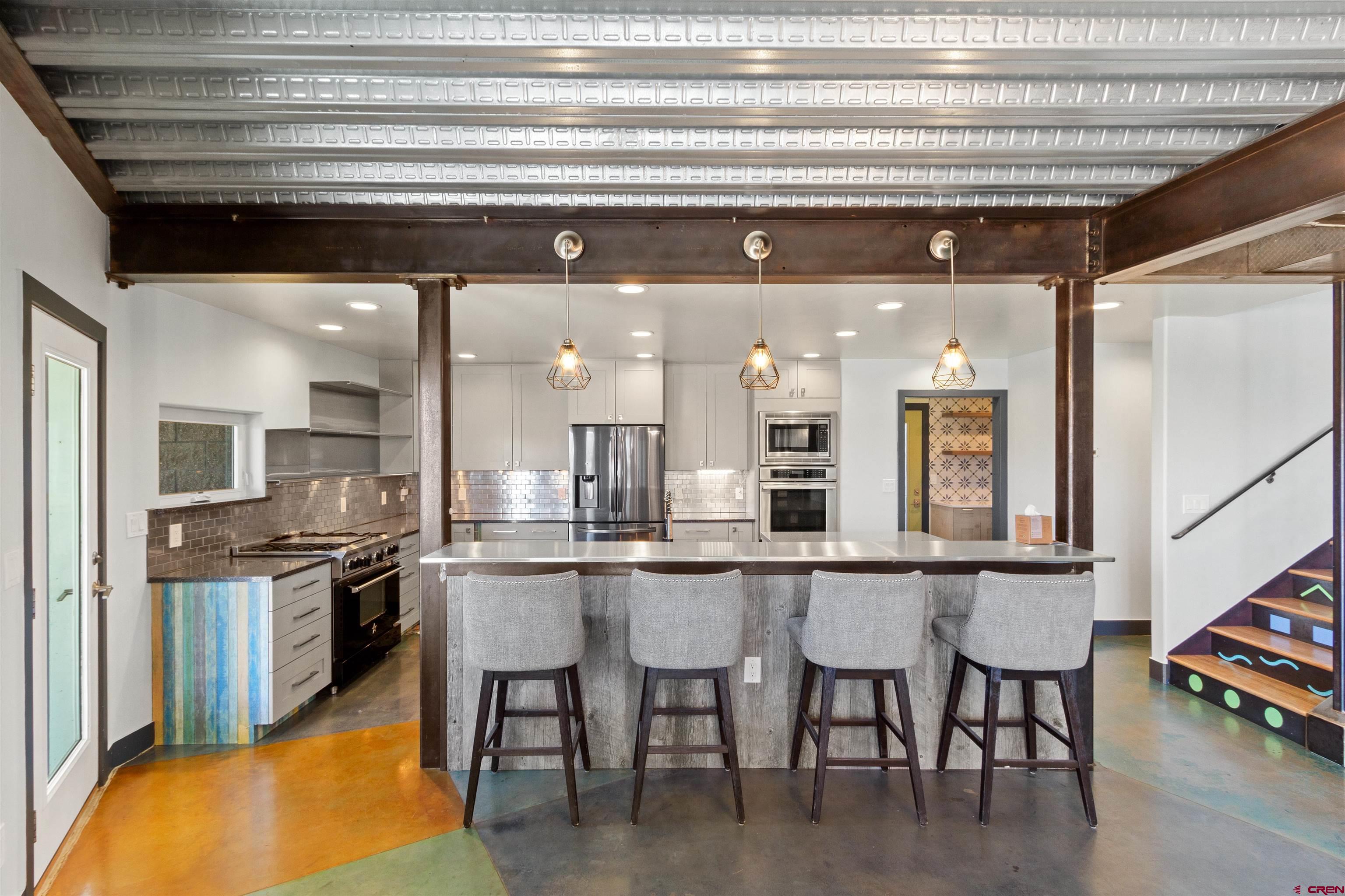 2192 Odelle Road Montrose, CO 81401 - Photo 8 of 45 a kitchen with a table and chairs in it