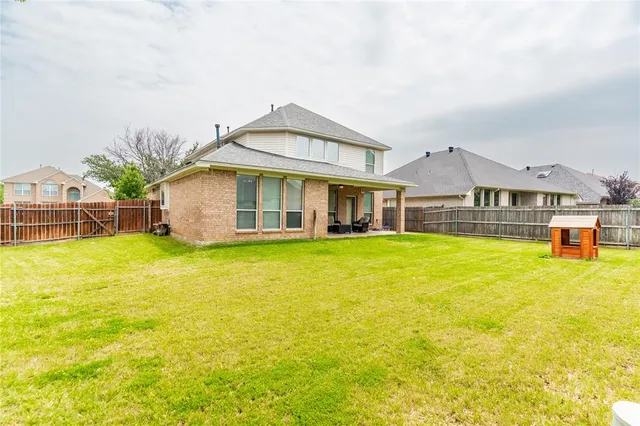 a front view of house with swimming pool