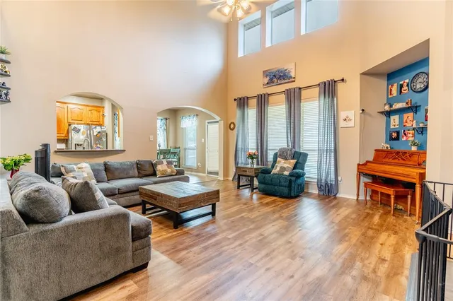 a living room with furniture or couch and a bookshelf