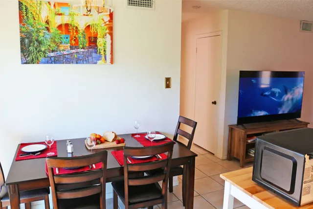 a view of a dining room with furniture