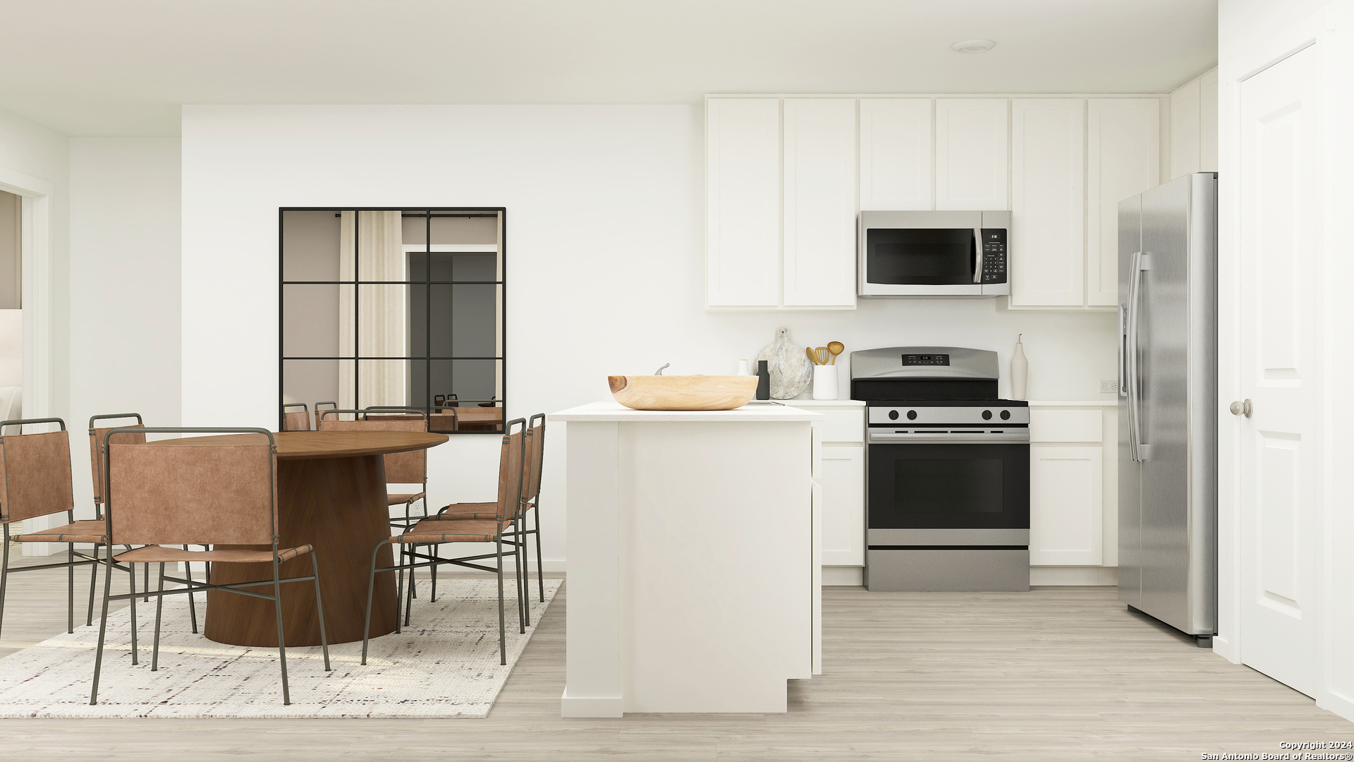 215 Pastar Falls Seguin, TX 78155 - Photo 8 of 20 a kitchen with stainless steel appliances kitchen island granite countertop a stove top oven microwave and cabinets