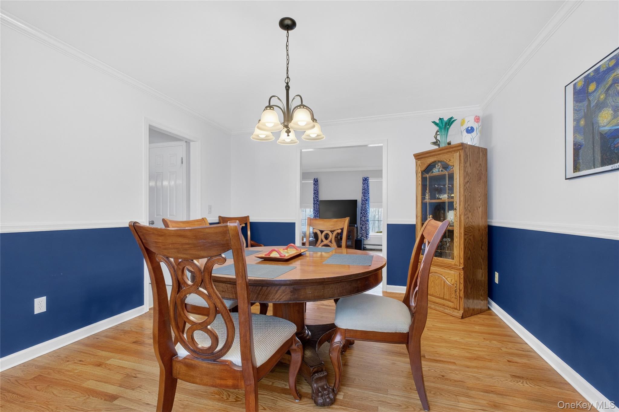 191 Forest Valley Road Pleasant Valley, NY 12569 - Photo 14 of 45 a view of a dining room with furniture and wooden floor