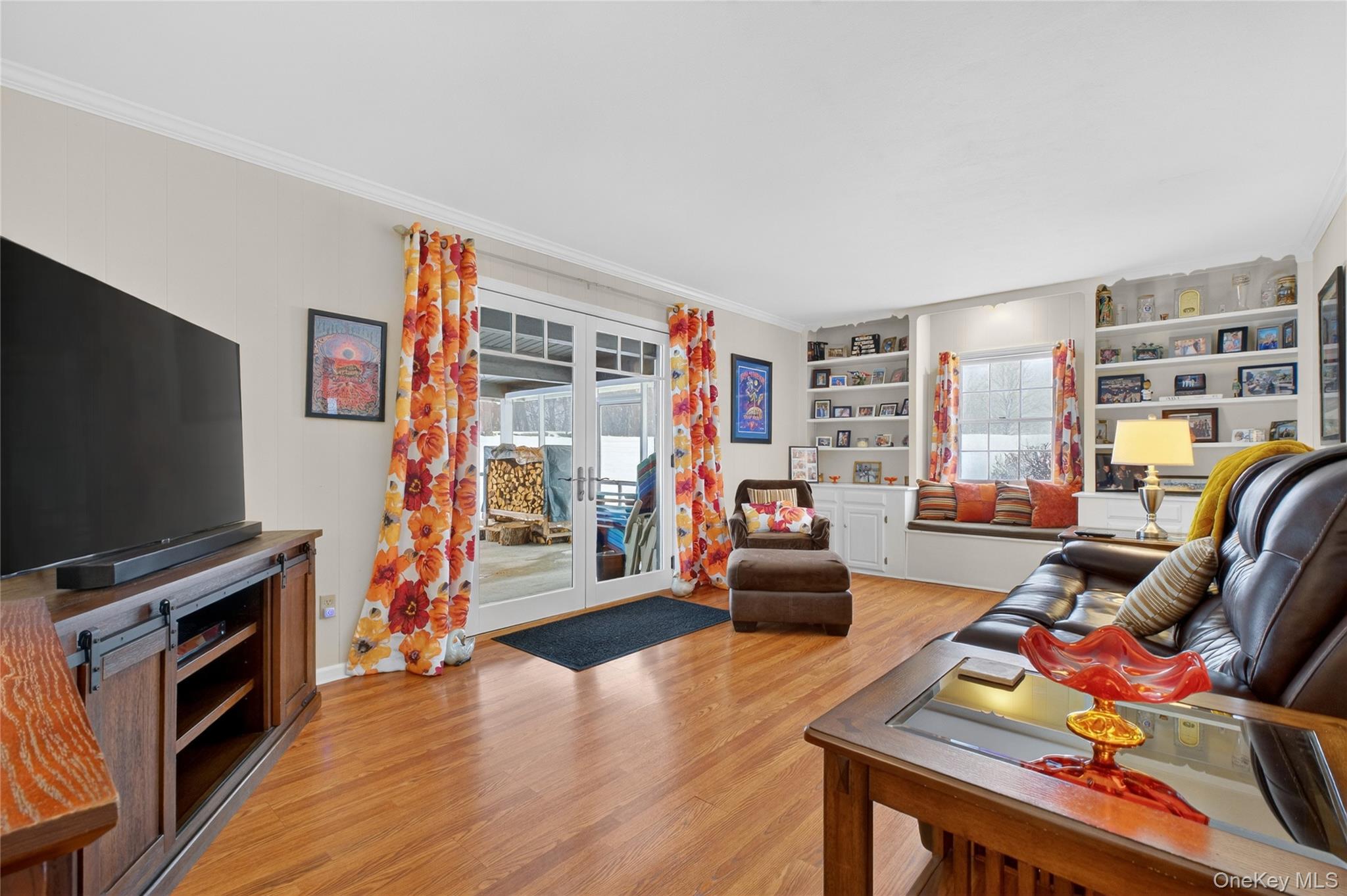 191 Forest Valley Road Pleasant Valley, NY 12569 - Photo 16 of 45 a living room with furniture and a flat screen tv