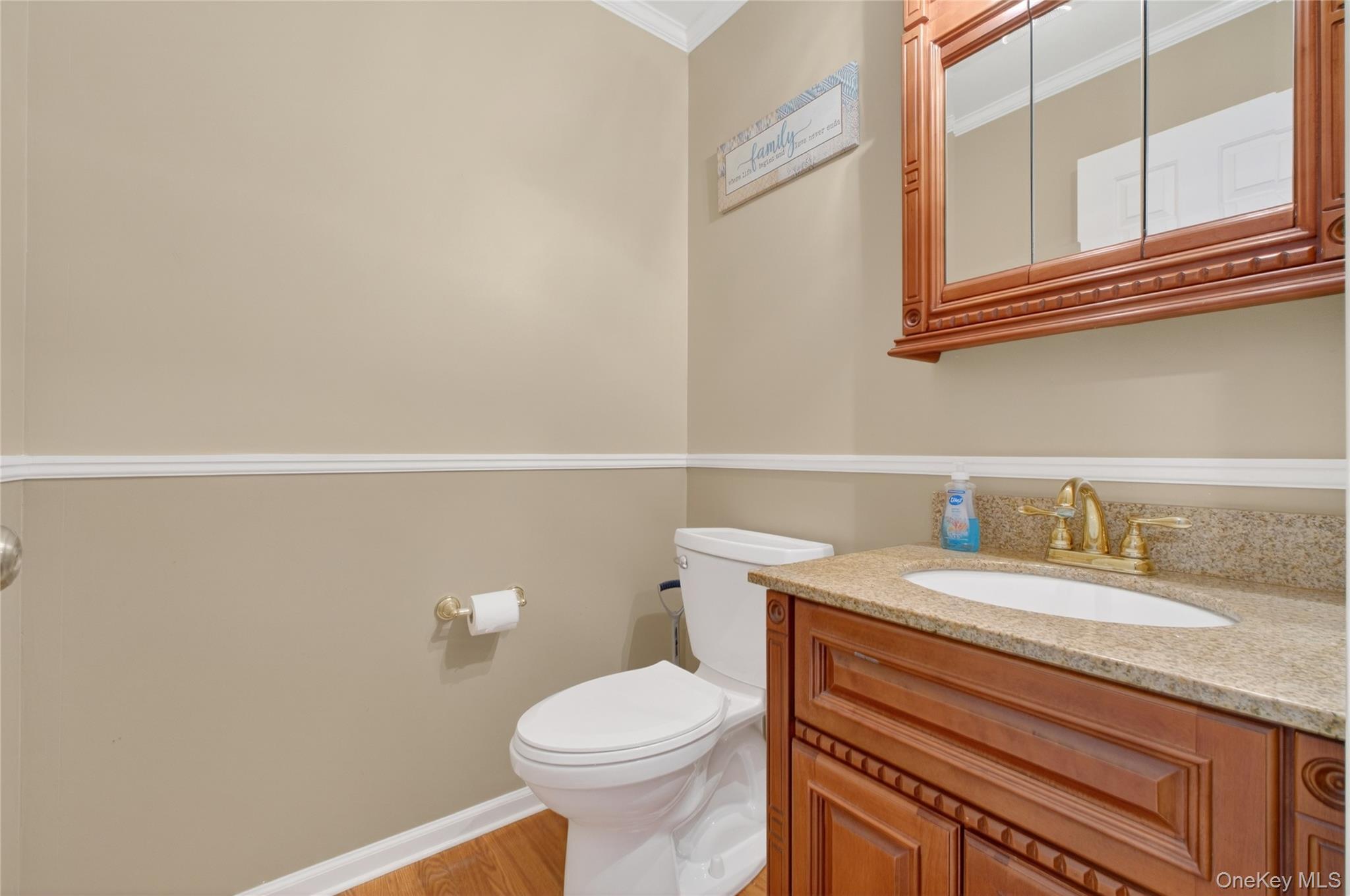 191 Forest Valley Road Pleasant Valley, NY 12569 - Photo 18 of 45 a bathroom with a sink a toilet and a mirror