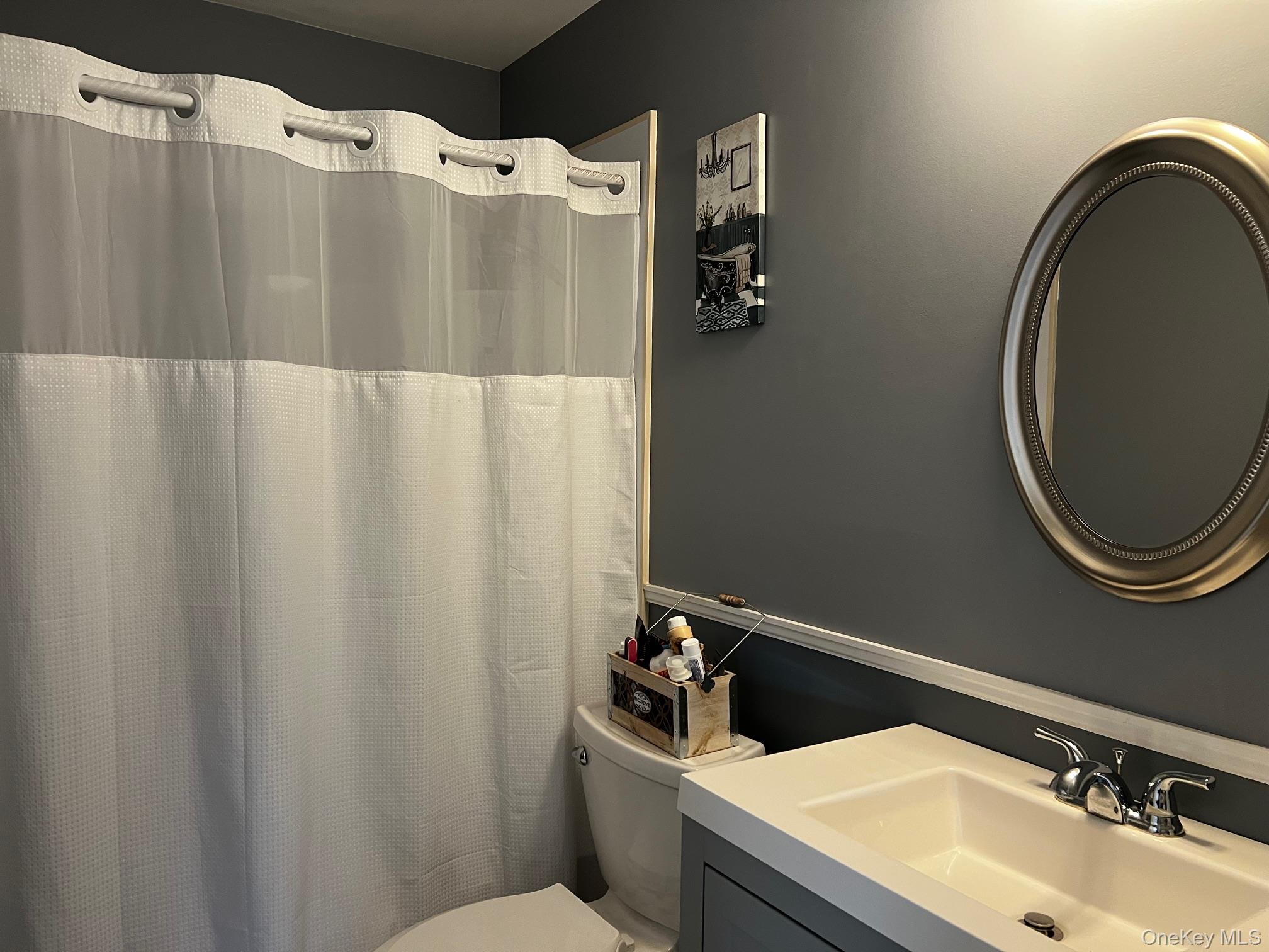 191 Forest Valley Road Pleasant Valley, NY 12569 - Photo 24 of 45 a bathroom with a sink and mirror