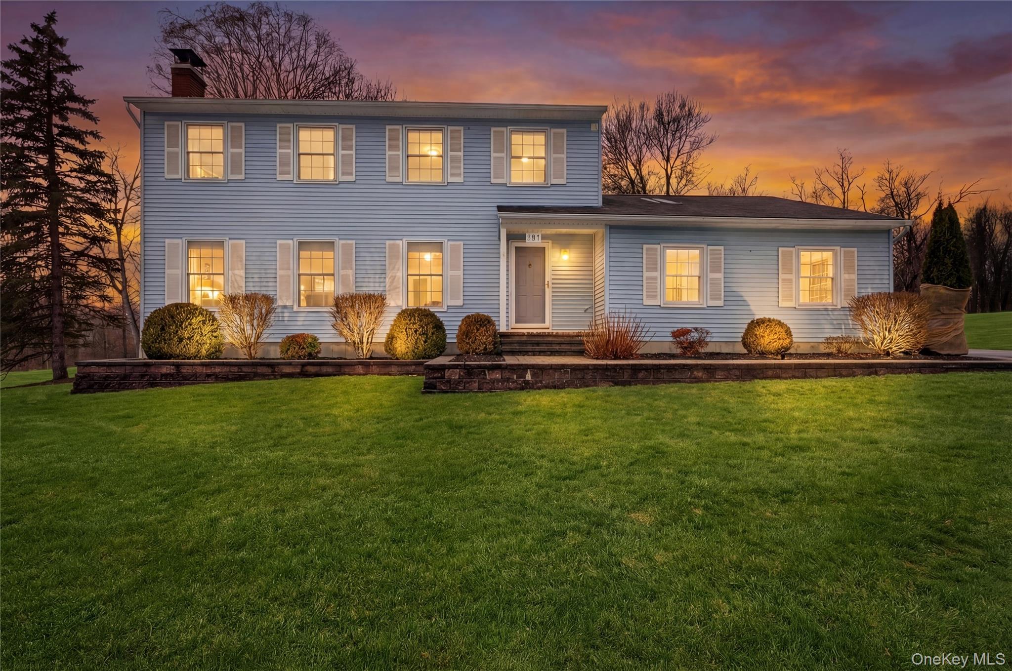 191 Forest Valley Road Pleasant Valley, NY 12569 - Photo 41 of 45 a front view of a house with a yard fire pit and outdoor seating