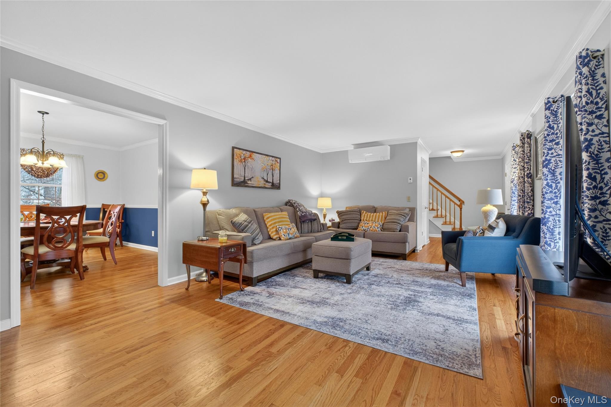 191 Forest Valley Road Pleasant Valley, NY 12569 - Photo 10 of 45 a living room with furniture and a wooden floor