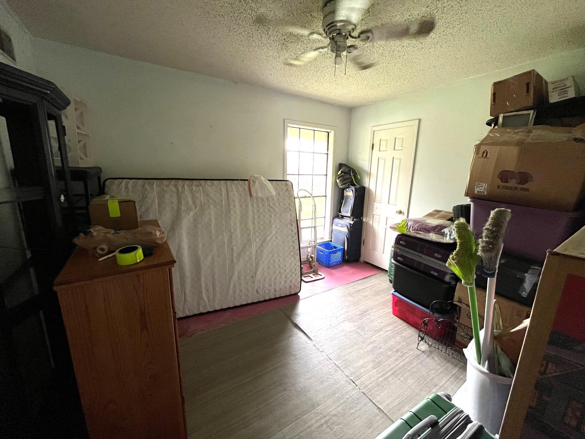 2467 Flowering Tree Drive Bartlett, TN 38134 - Photo 14 of 22 a living room with furniture and a flat screen tv