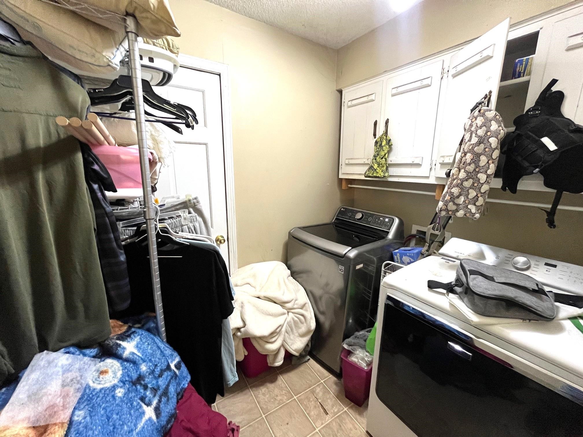 2467 Flowering Tree Drive Bartlett, TN 38134 - Photo 18 of 22 a bedroom with a bed and a window