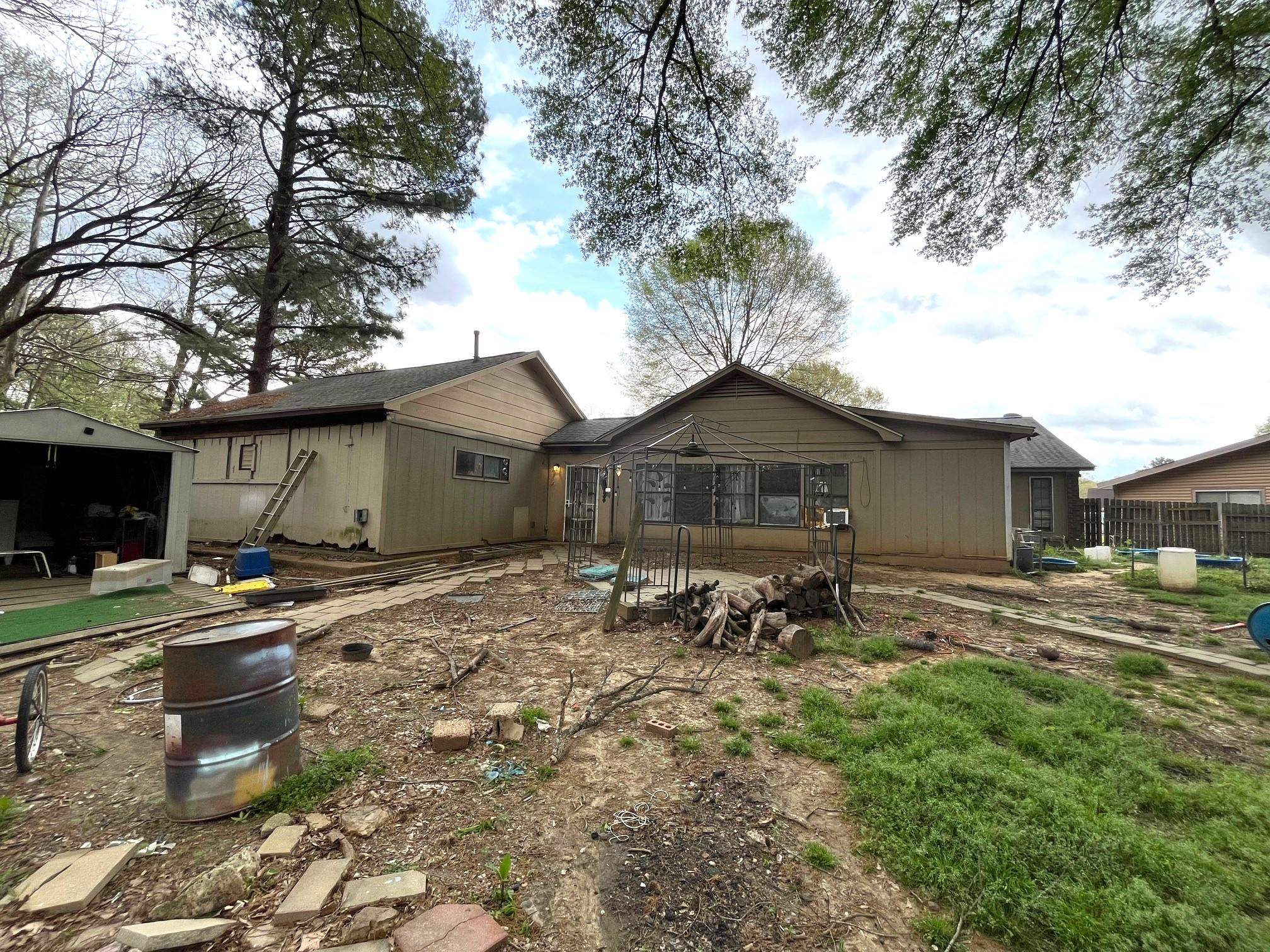 2467 Flowering Tree Drive Bartlett, TN 38134 - Photo 22 of 22 a backyard of a house with table and chairs