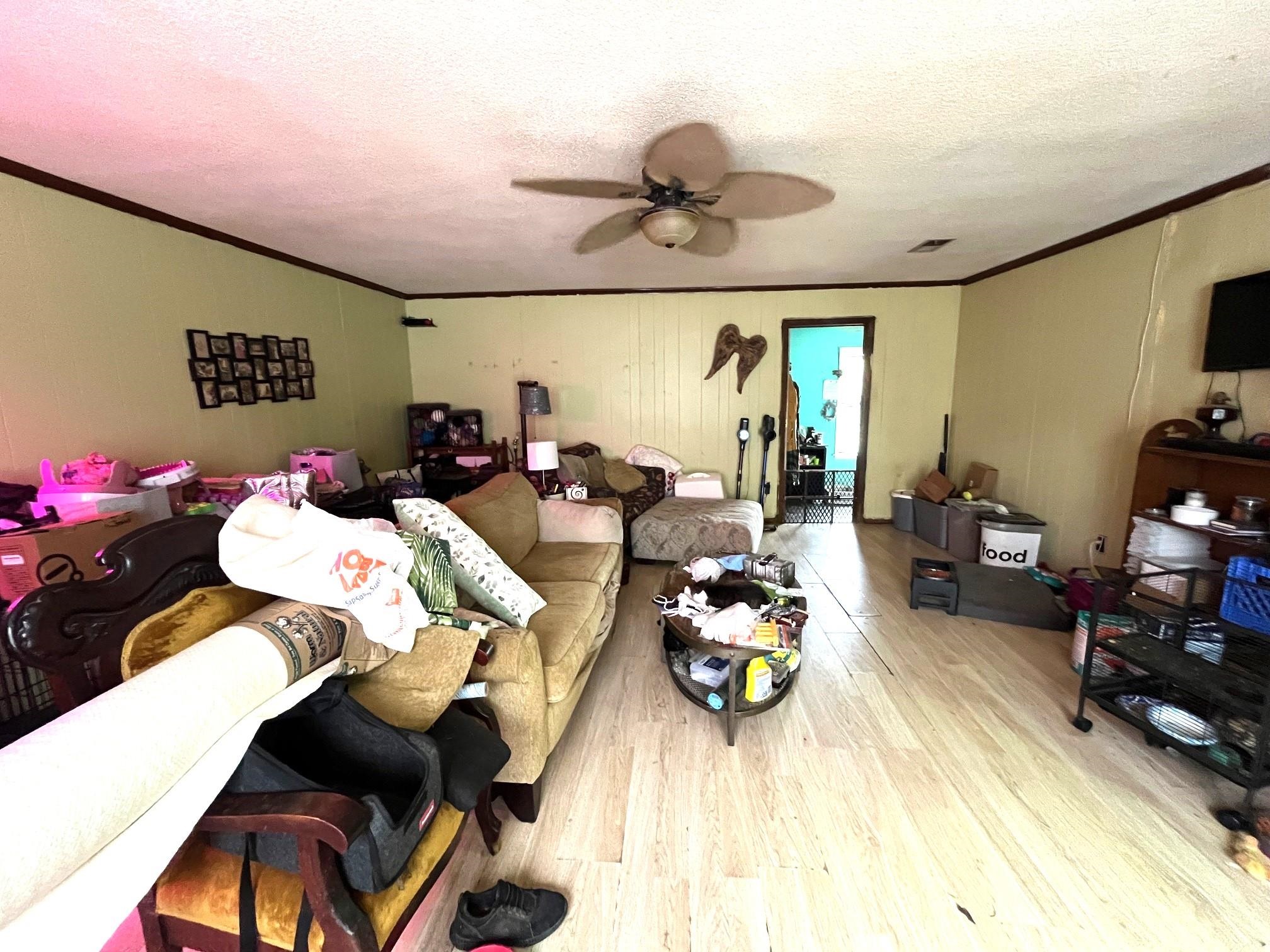 2467 Flowering Tree Drive Bartlett, TN 38134 - Photo 9 of 22 a living room with lots of furniture and a large window