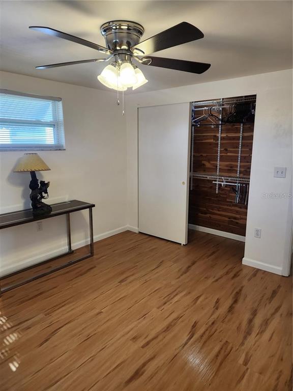7021 Sonata Drive Port Richey, FL 34668 - Photo 7 of 14 a view of an empty room with a window