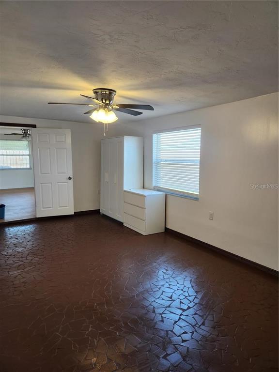 7021 Sonata Drive Port Richey, FL 34668 - Photo 9 of 14 a view of a room with window and kitchen view