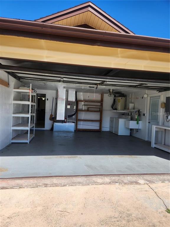 7021 Sonata Drive Port Richey, FL 34668 - Photo 10 of 14 a view of storage and utility room