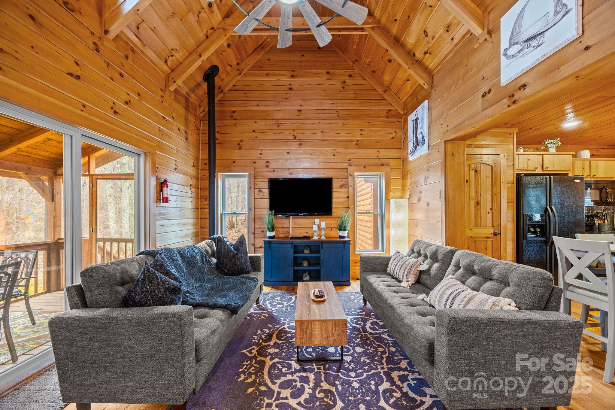 749 Buck Road Tryon, NC 28782 - Photo 7 of 45 a living room with furniture and a fireplace