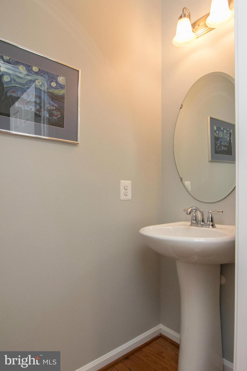 8485 Grove Angle Road, Unit 11 Ellicott City, MD 21043 - Photo 11 of 28 Main level powder room