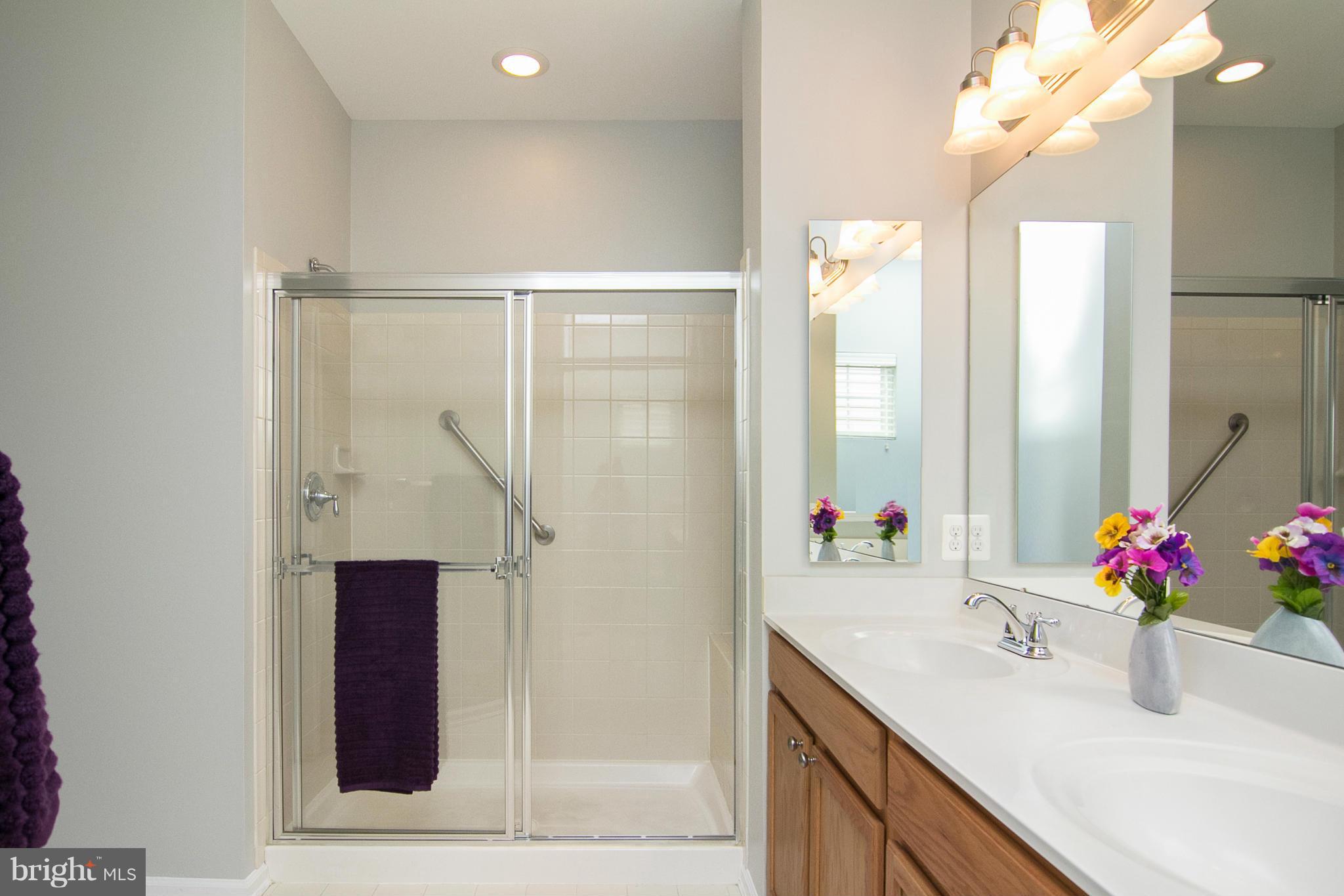 8485 Grove Angle Road, Unit 11 Ellicott City, MD 21043 - Photo 14 of 28 Master bath w/tiled shower