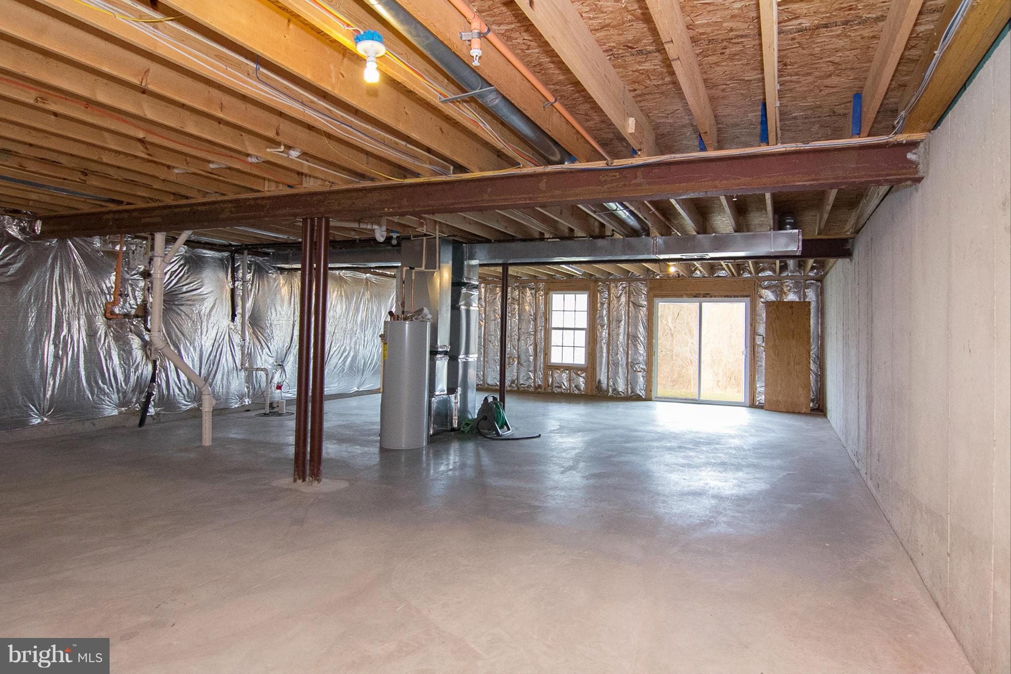 8485 Grove Angle Road, Unit 11 Ellicott City, MD 21043 - Photo 22 of 28 Large unfinished basement with walk-out