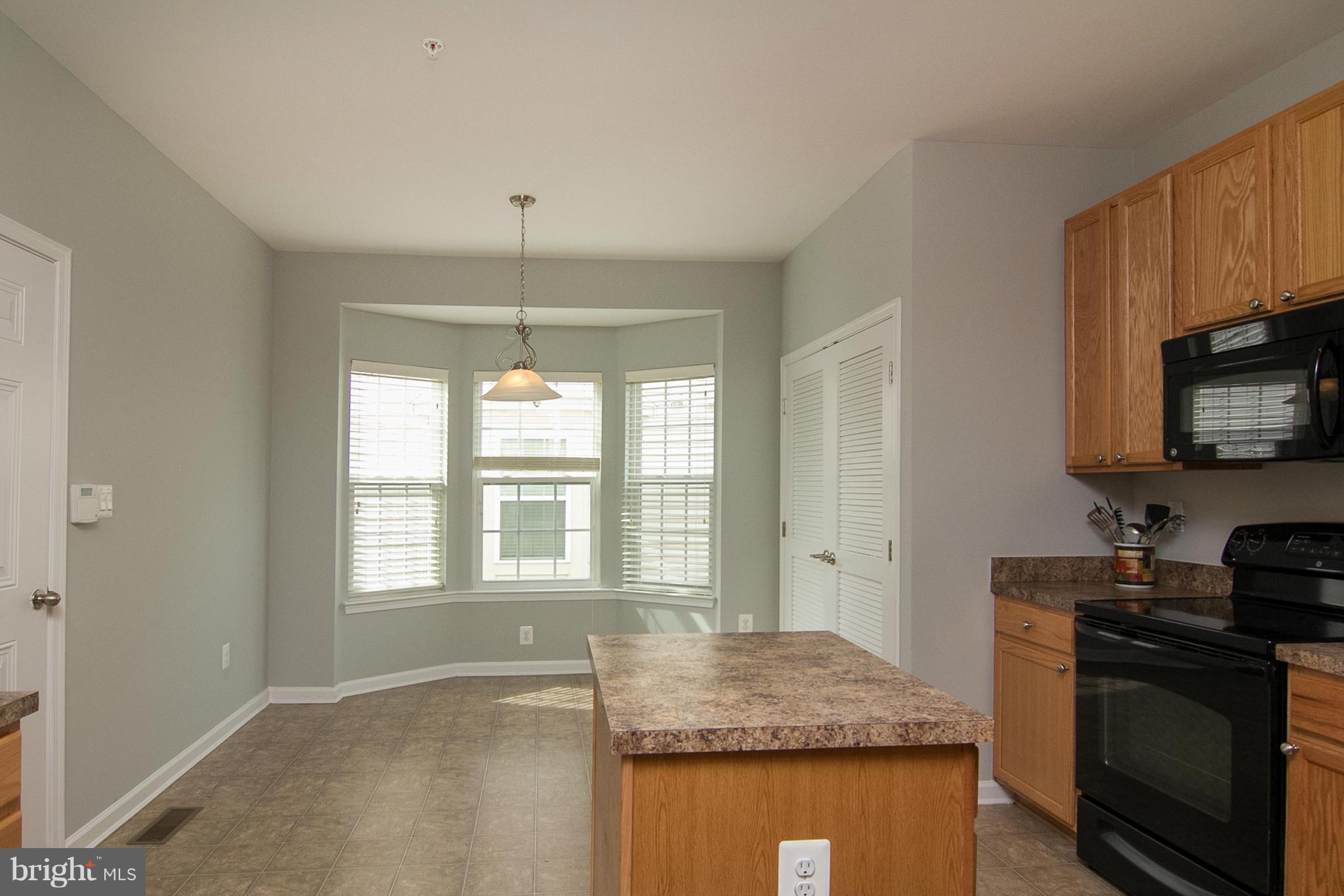 8485 Grove Angle Road, Unit 11 Ellicott City, MD 21043 - Photo 8 of 28 Kitchen with Breakfast Nook