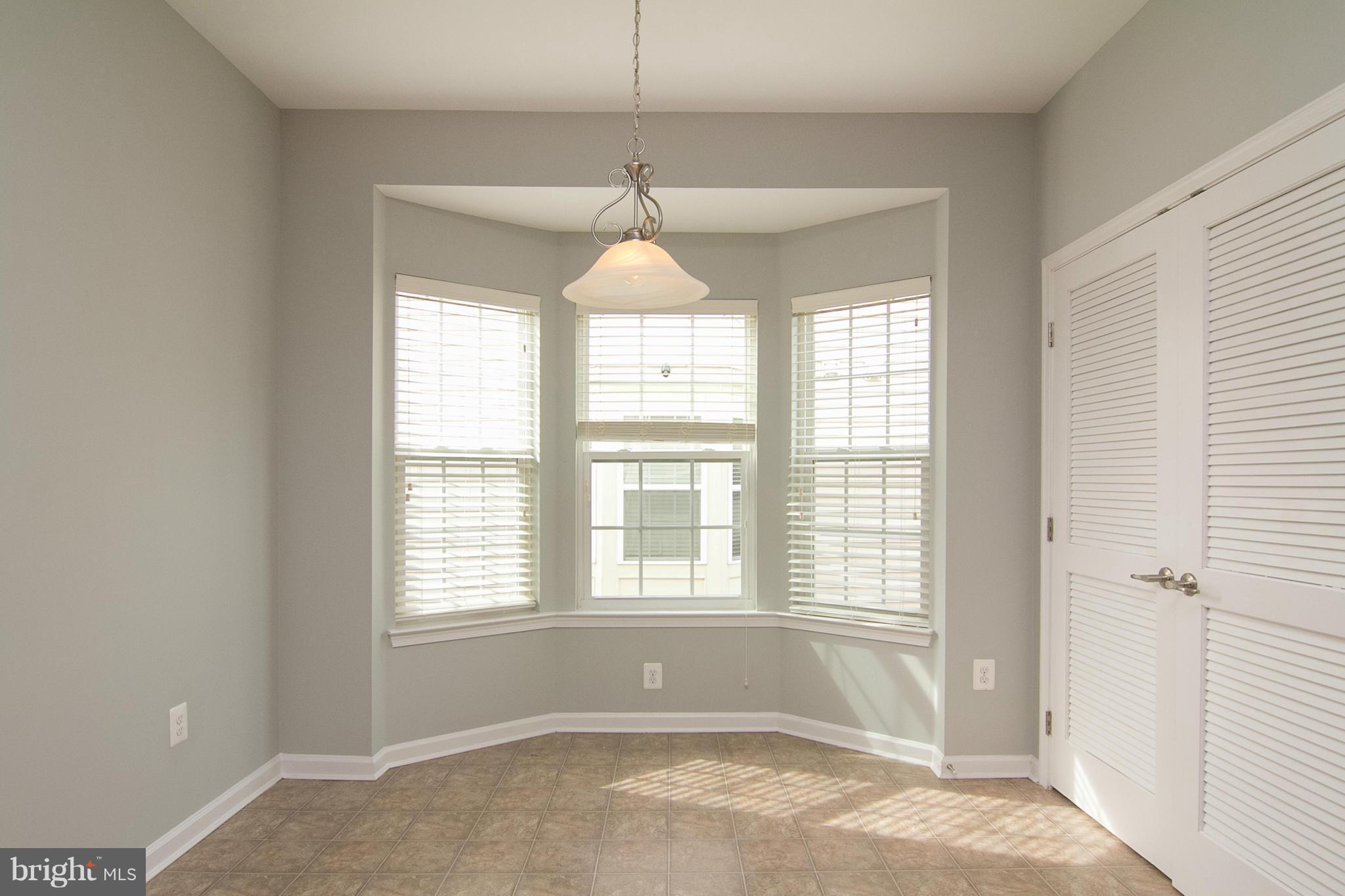 8485 Grove Angle Road, Unit 11 Ellicott City, MD 21043 - Photo 9 of 28 Breakfast Nook with lots of light