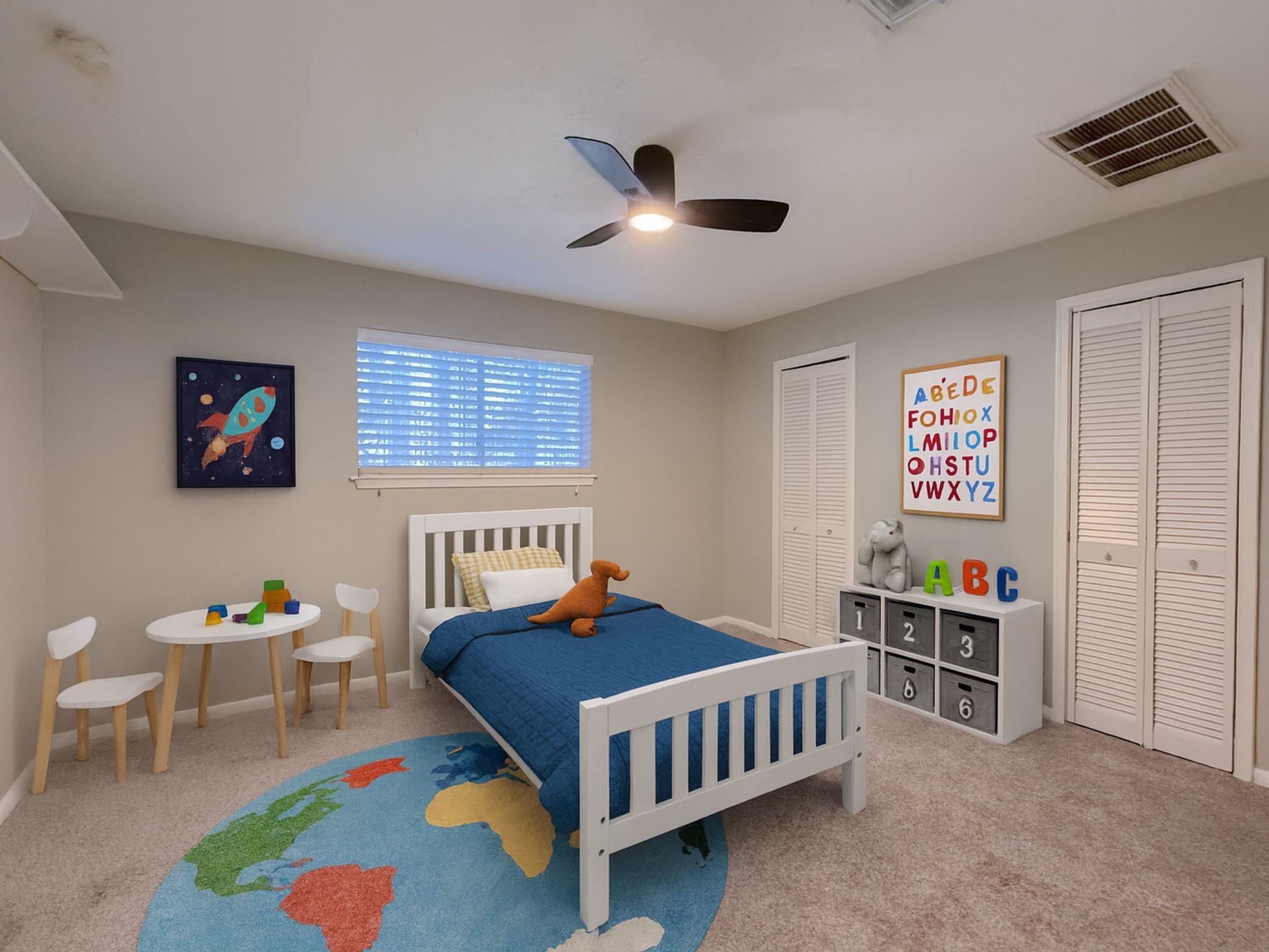 15619 Ripplewind Lane Houston, TX 77068 - Photo 13 of 31 a bedroom with furniture and a window
