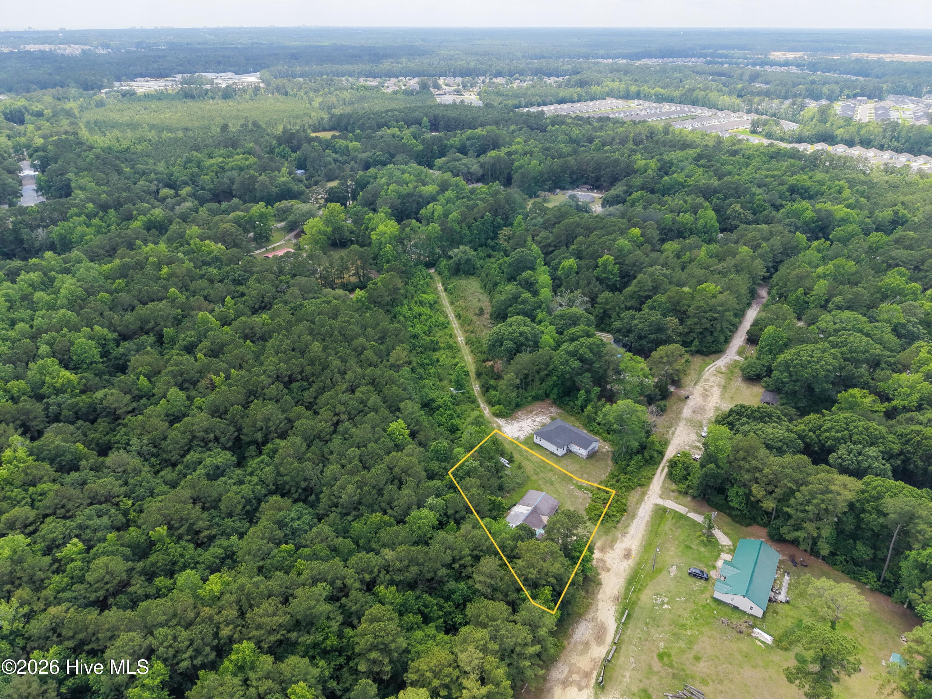 586 Tree Acres Circle Northwest, Unit 1 Calabash, NC 28467 - Photo 6 of 6 586 - DroneLine2