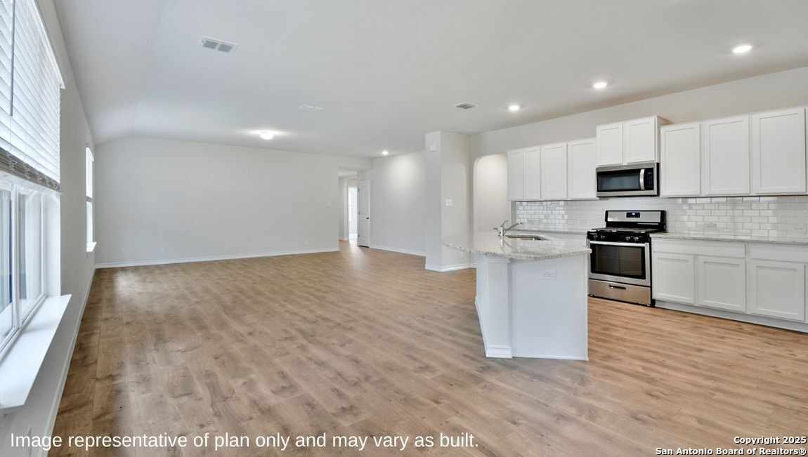 12623 Azopardo Converse, TX 78109 - Photo 4 of 35 a view of kitchen with granite countertop stainless steel appliances refrigerator sink and cabinets