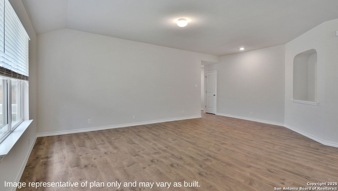 12623 Azopardo Converse, TX 78109 - Photo 8 of 35 an empty room with wooden floor and windows