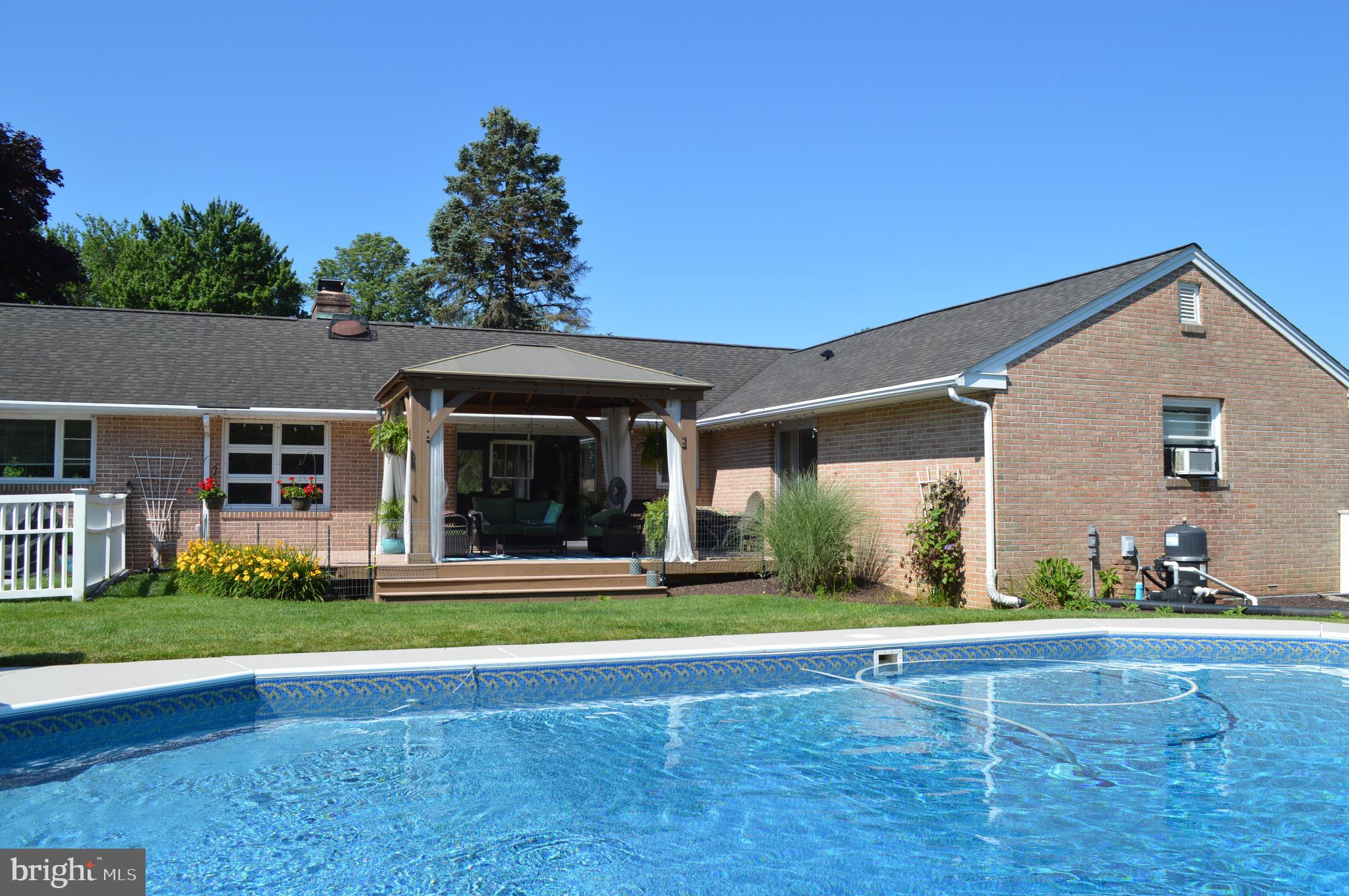 95 Russell Road Phoenixville, PA 19460 - Photo 31 of 37 Back of the house and pool