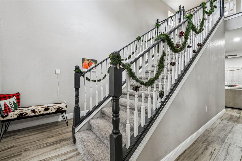 748 McClellan Road Frostproof, FL 33843 - Photo 2 of 31 a view of entryway bedroom and hall with wooden floor