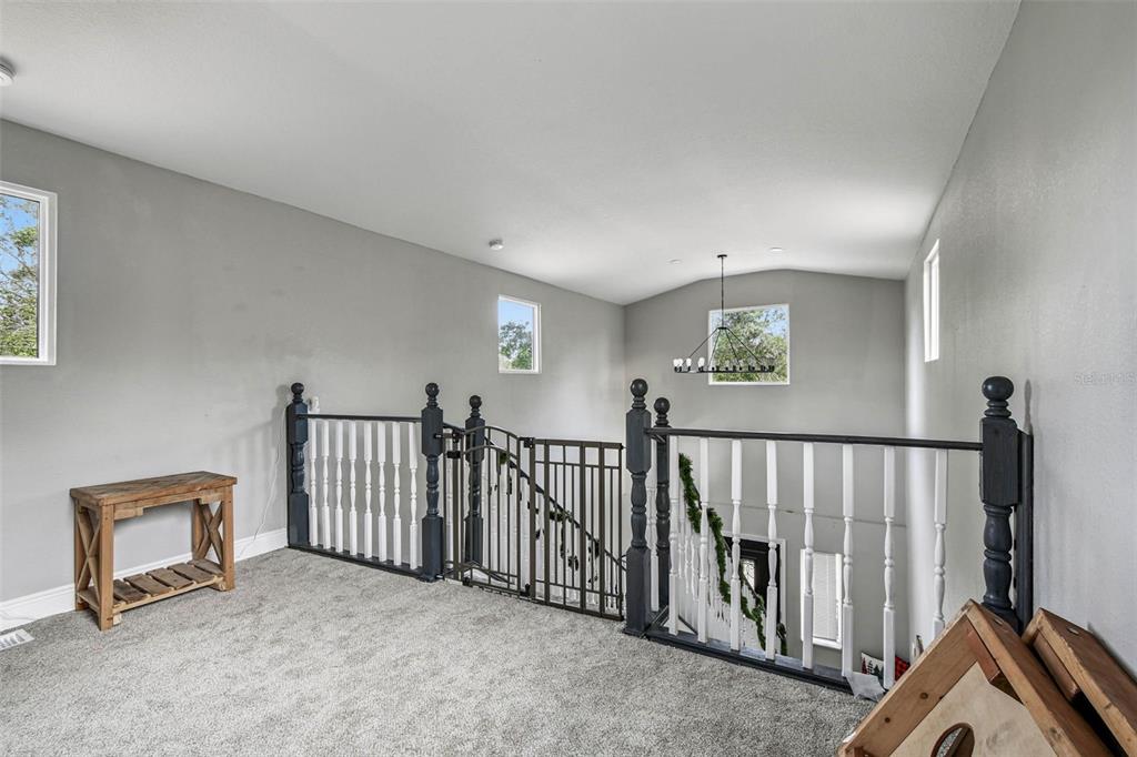 748 McClellan Road Frostproof, FL 33843 - Photo 27 of 31 a view of a hallway with interior of the house