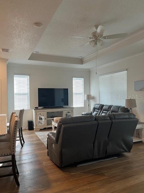 7882 Southwest 85th Loop Ocala, FL 34476 - Photo 12 of 27 a living room with furniture and a flat screen tv