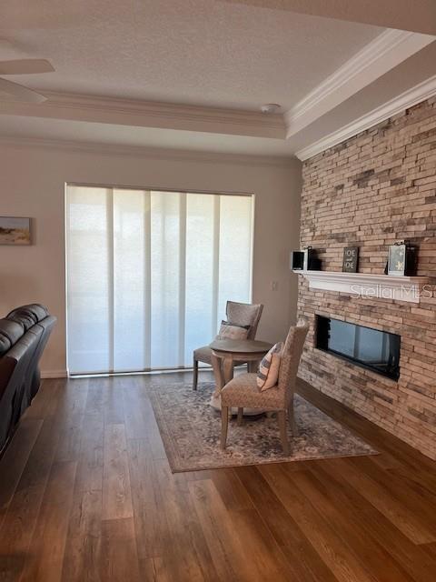 7882 Southwest 85th Loop Ocala, FL 34476 - Photo 19 of 27 a living room with furniture and a fireplace