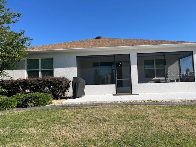 7882 Southwest 85th Loop Ocala, FL 34476 - Photo 23 of 27 a view of a house with a garden