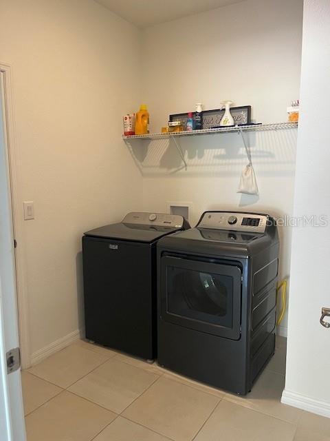7882 Southwest 85th Loop Ocala, FL 34476 - Photo 25 of 27 a kitchen with a stove and a cabinets