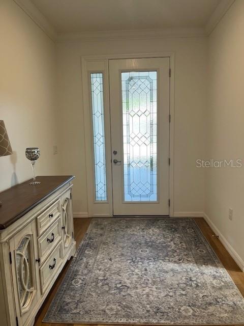 7882 Southwest 85th Loop Ocala, FL 34476 - Photo 4 of 27 a view of an empty room with window and cabinet