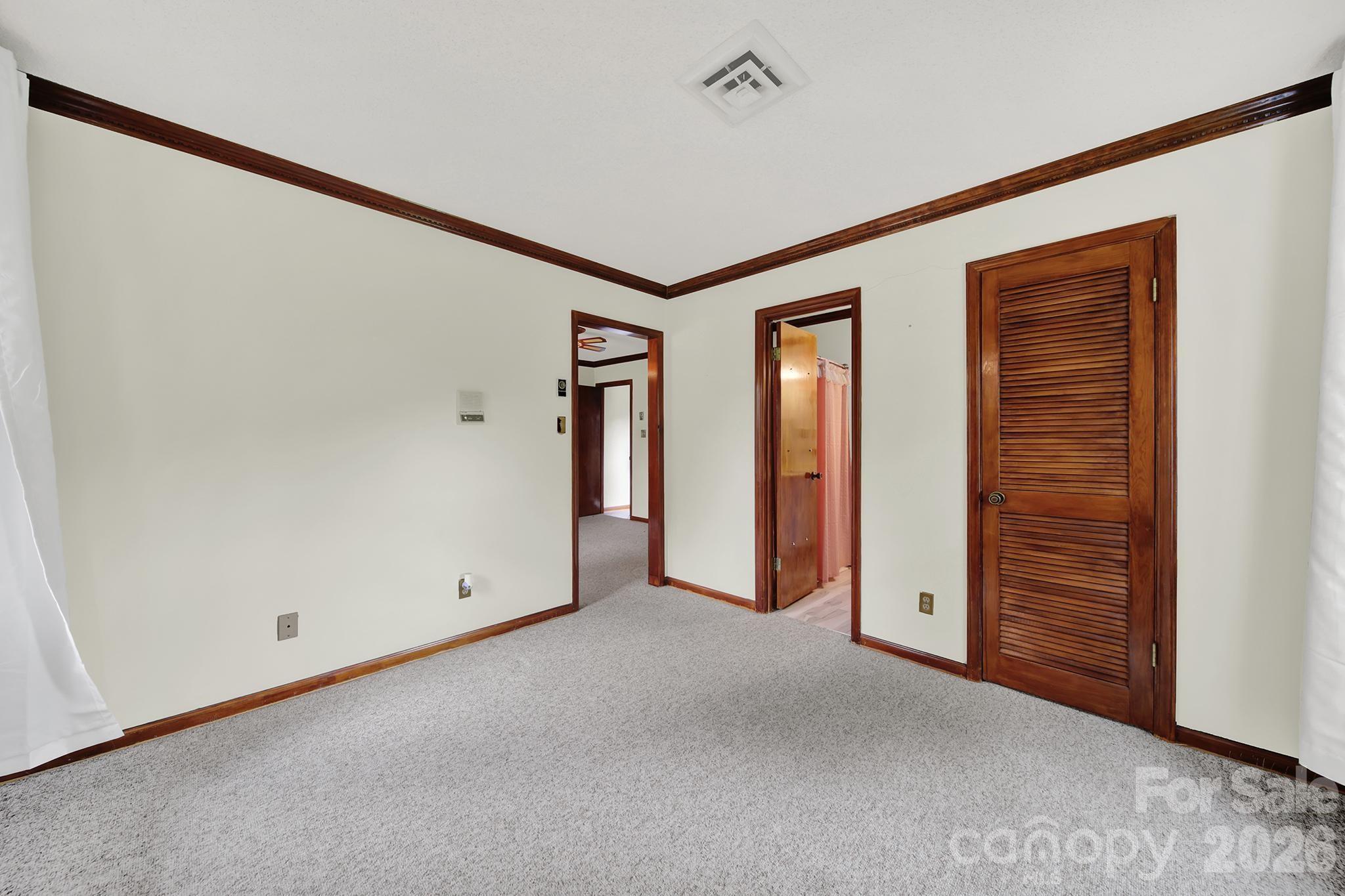 5913 Tom Query Road Charlotte, NC 28213 - Photo 25 of 47 an empty room with closet