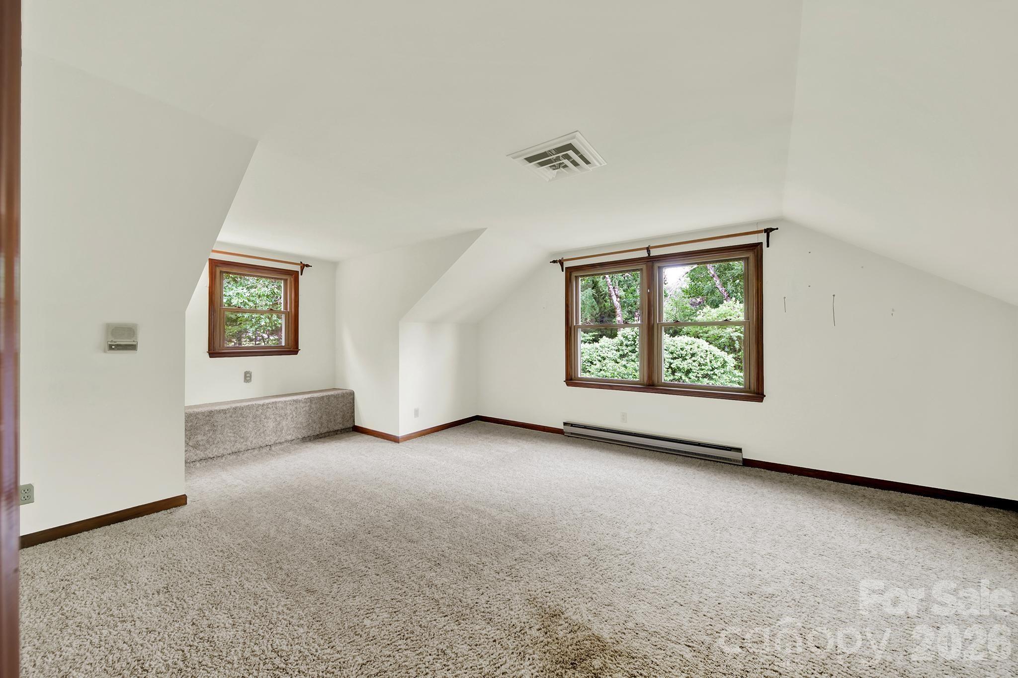 5913 Tom Query Road Charlotte, NC 28213 - Photo 32 of 47 an empty room with windows