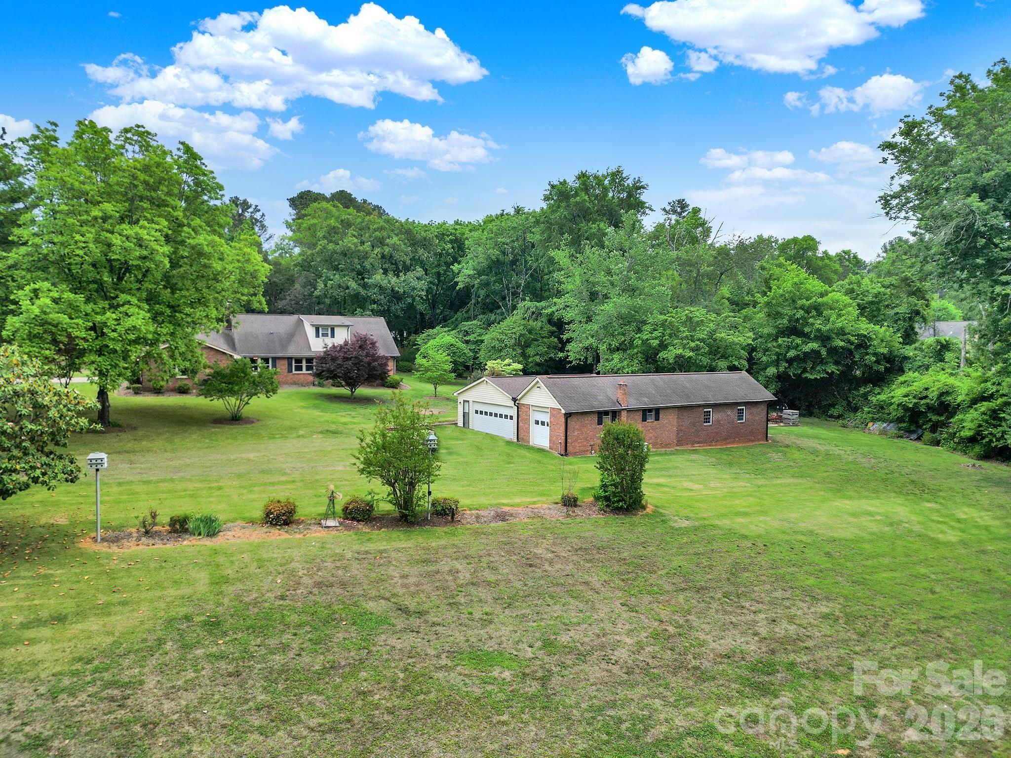 5913 Tom Query Road Charlotte, NC 28213 - Photo 41 of 47 an aerial view of a house with pool garden and outdoor seating