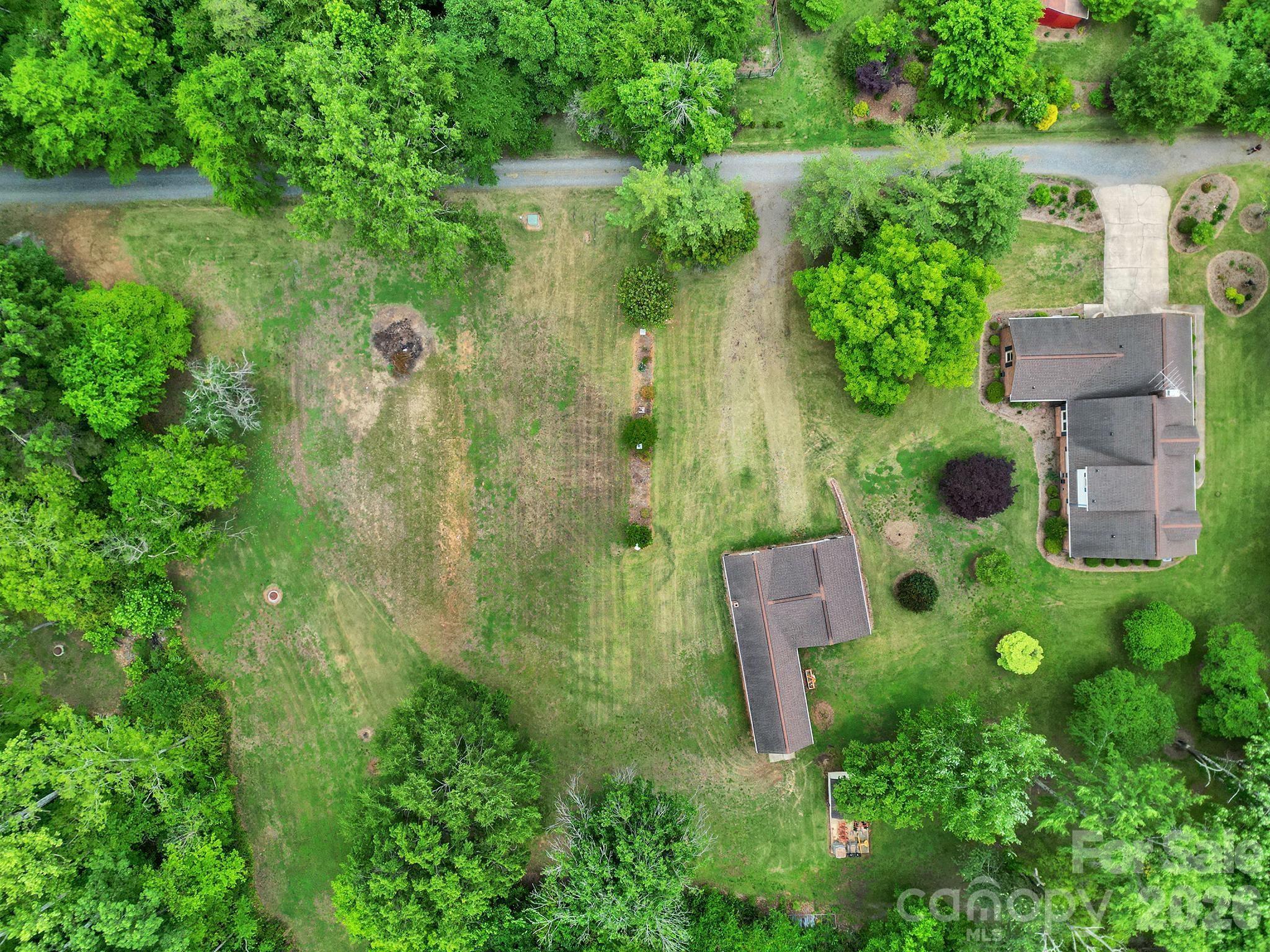 5913 Tom Query Road Charlotte, NC 28213 - Photo 42 of 47 an aerial view of residential house with outdoor space and lake view