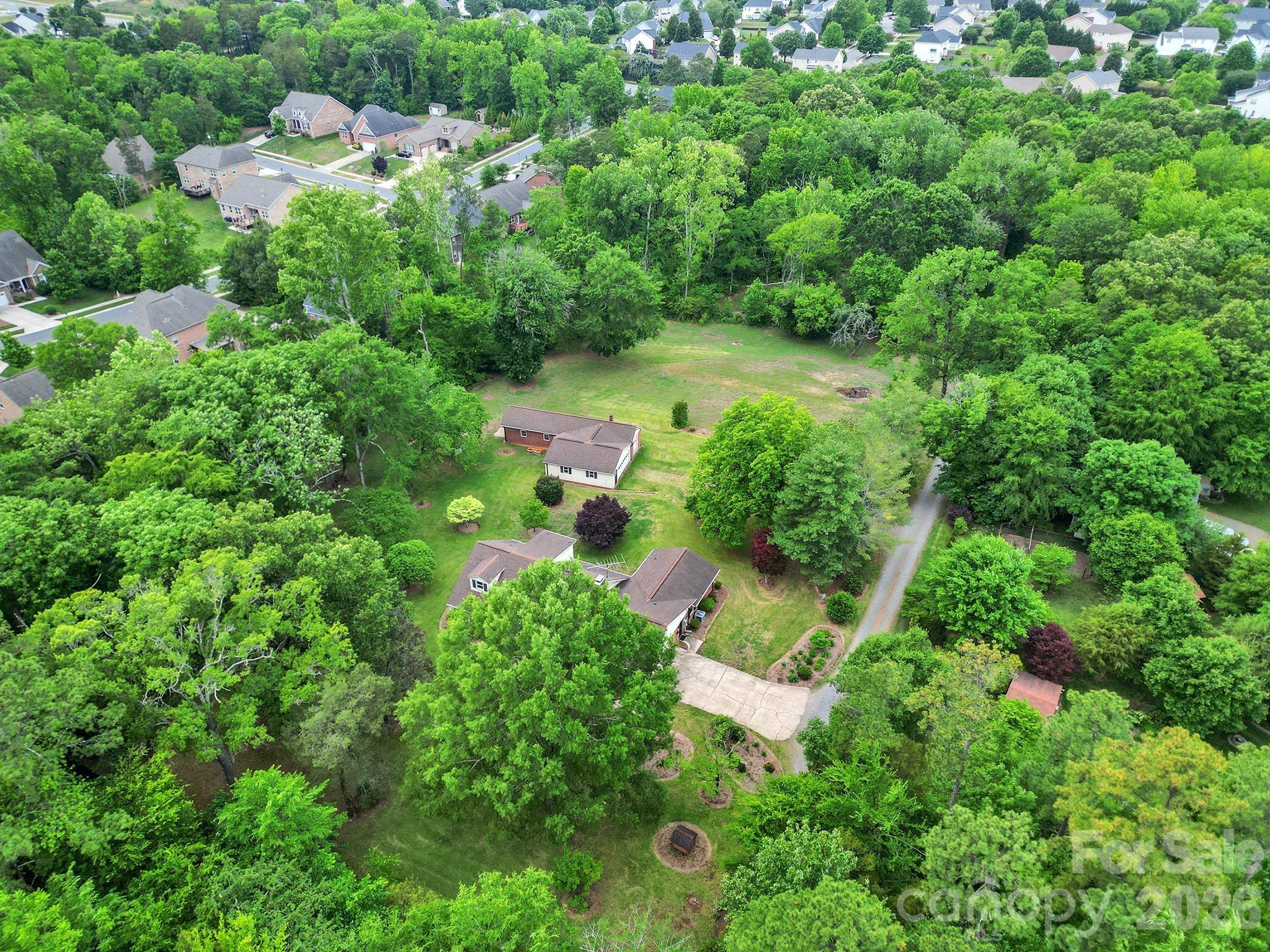 5913 Tom Query Road Charlotte, NC 28213 - Photo 43 of 47 an aerial view of residential house with outdoor space and trees all around