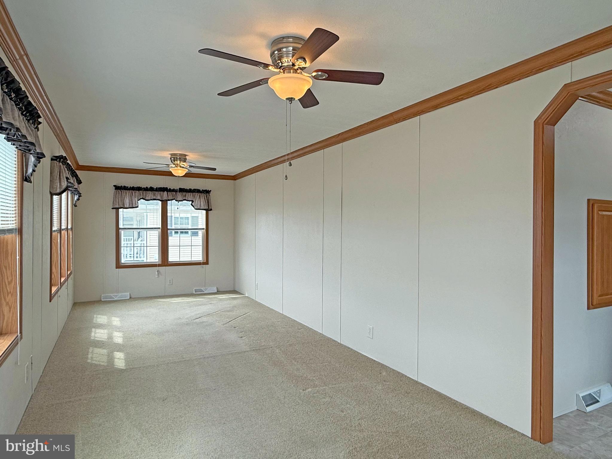 25 Baybreeze Road, Unit C29 Rehoboth Beach, DE 19971 - Photo 12 of 36 a view of an empty room with a window