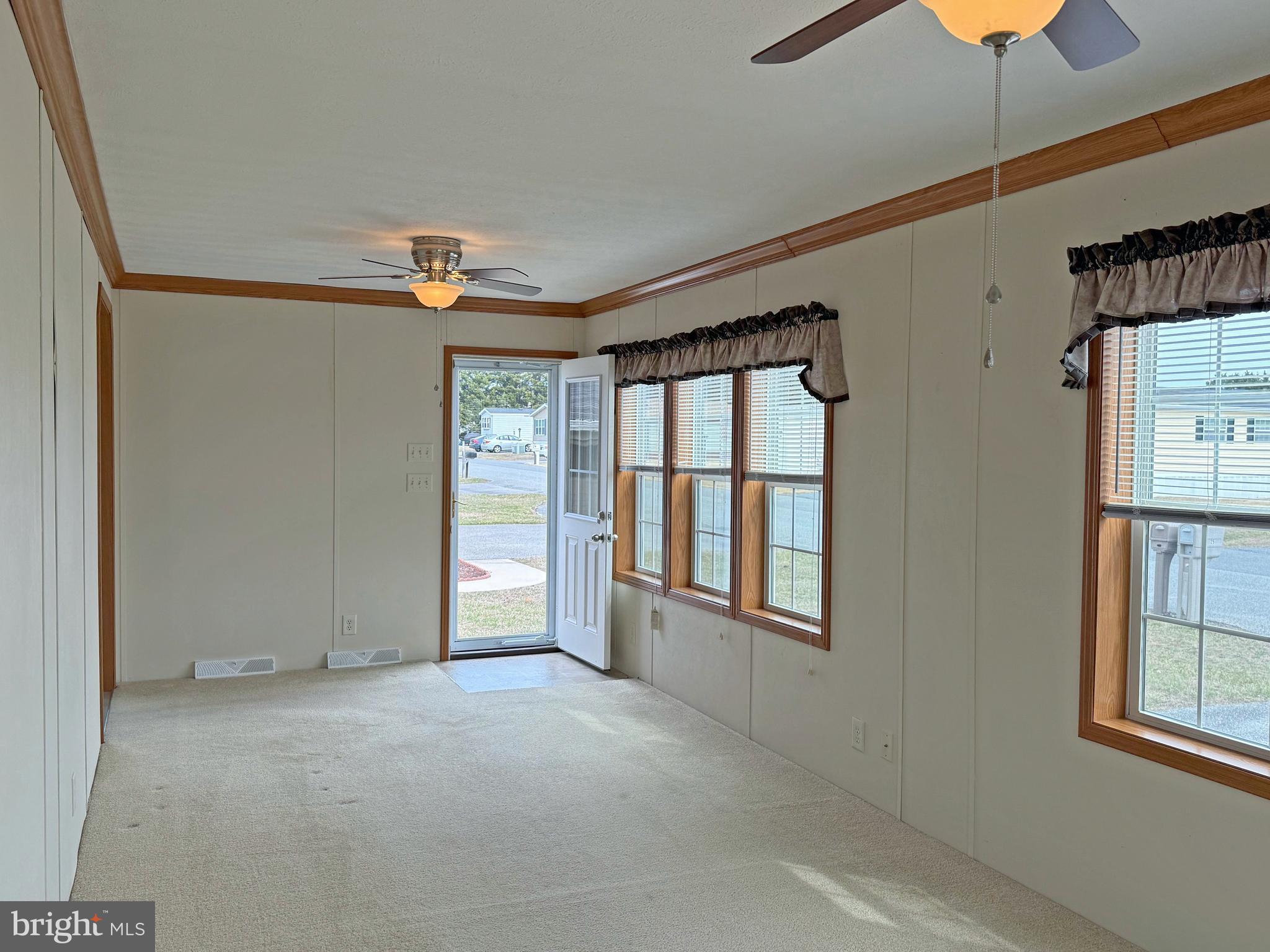 25 Baybreeze Road, Unit C29 Rehoboth Beach, DE 19971 - Photo 13 of 36 a view of an empty room with a window