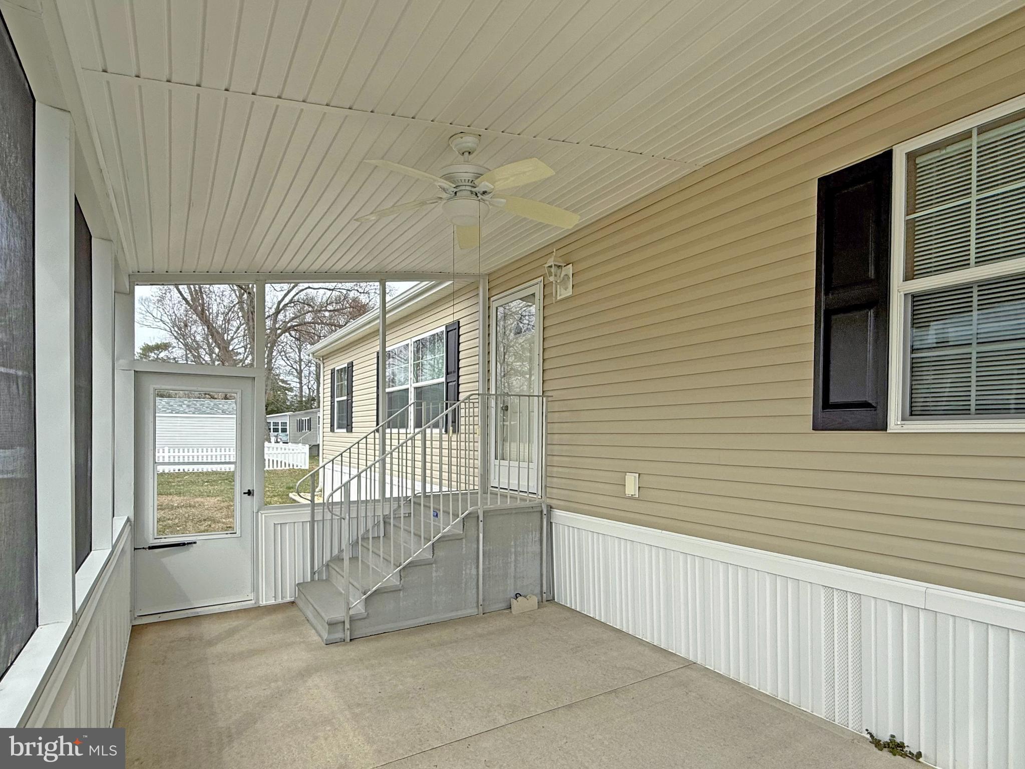 25 Baybreeze Road, Unit C29 Rehoboth Beach, DE 19971 - Photo 2 of 36 a view of an entryway with a glass door