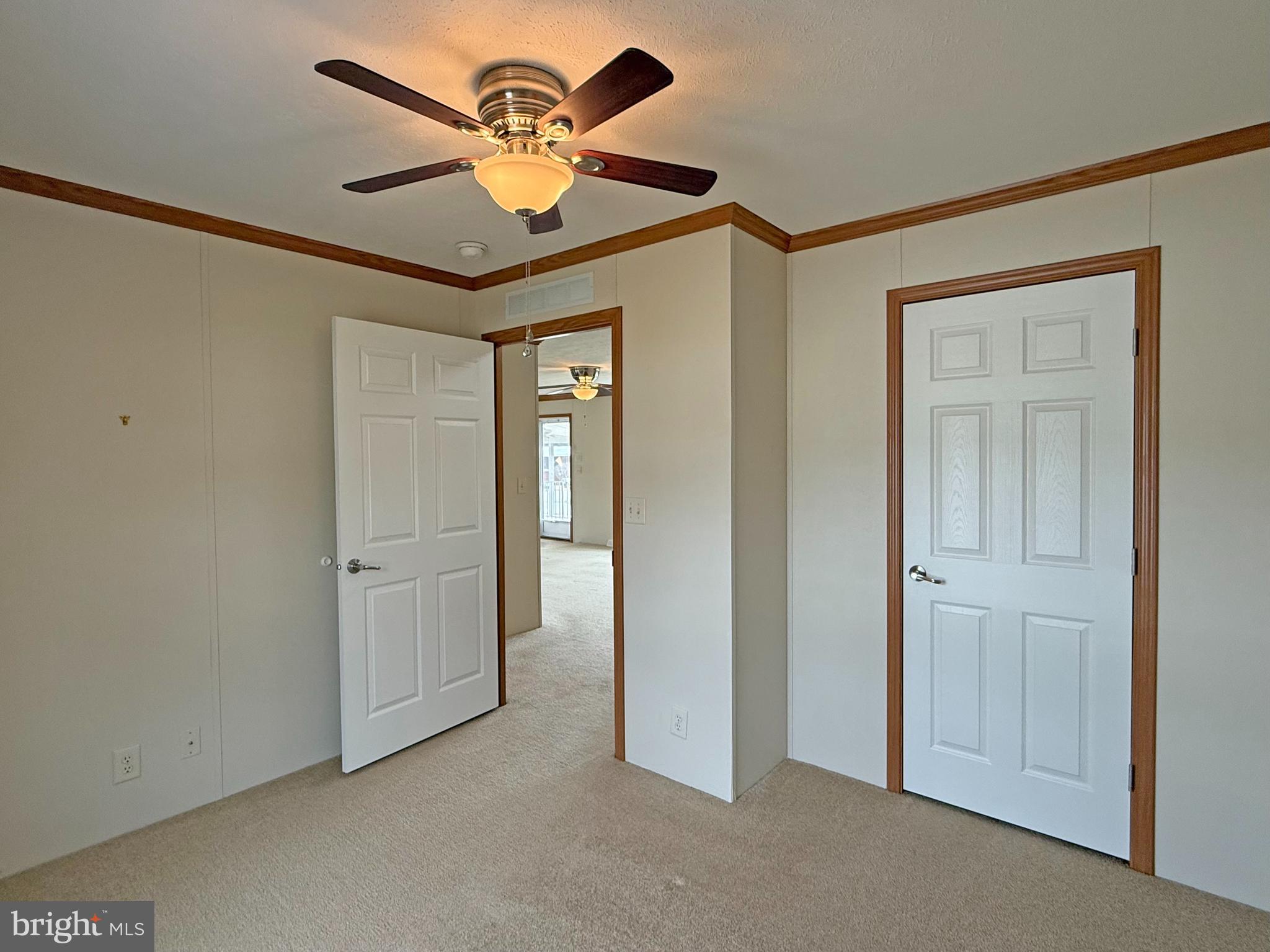 25 Baybreeze Road, Unit C29 Rehoboth Beach, DE 19971 - Photo 20 of 36 a view of a livingroom with a ceiling fan