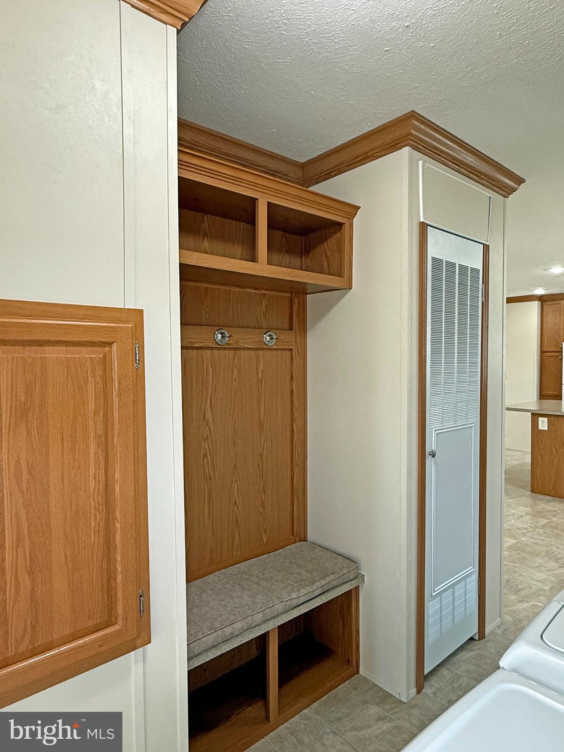 25 Baybreeze Road, Unit C29 Rehoboth Beach, DE 19971 - Photo 26 of 36 a hallway with closet