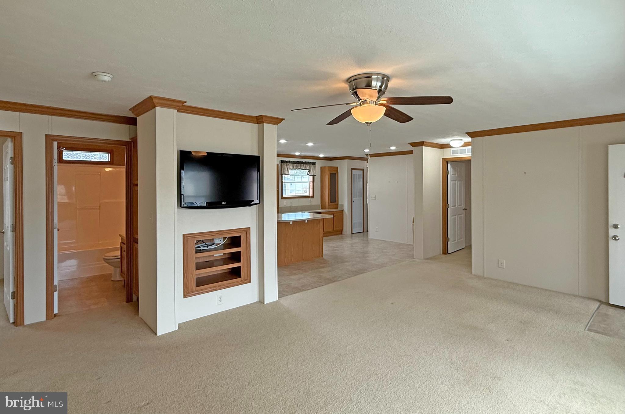 25 Baybreeze Road, Unit C29 Rehoboth Beach, DE 19971 - Photo 4 of 36 a view of a livingroom with a flat screen tv