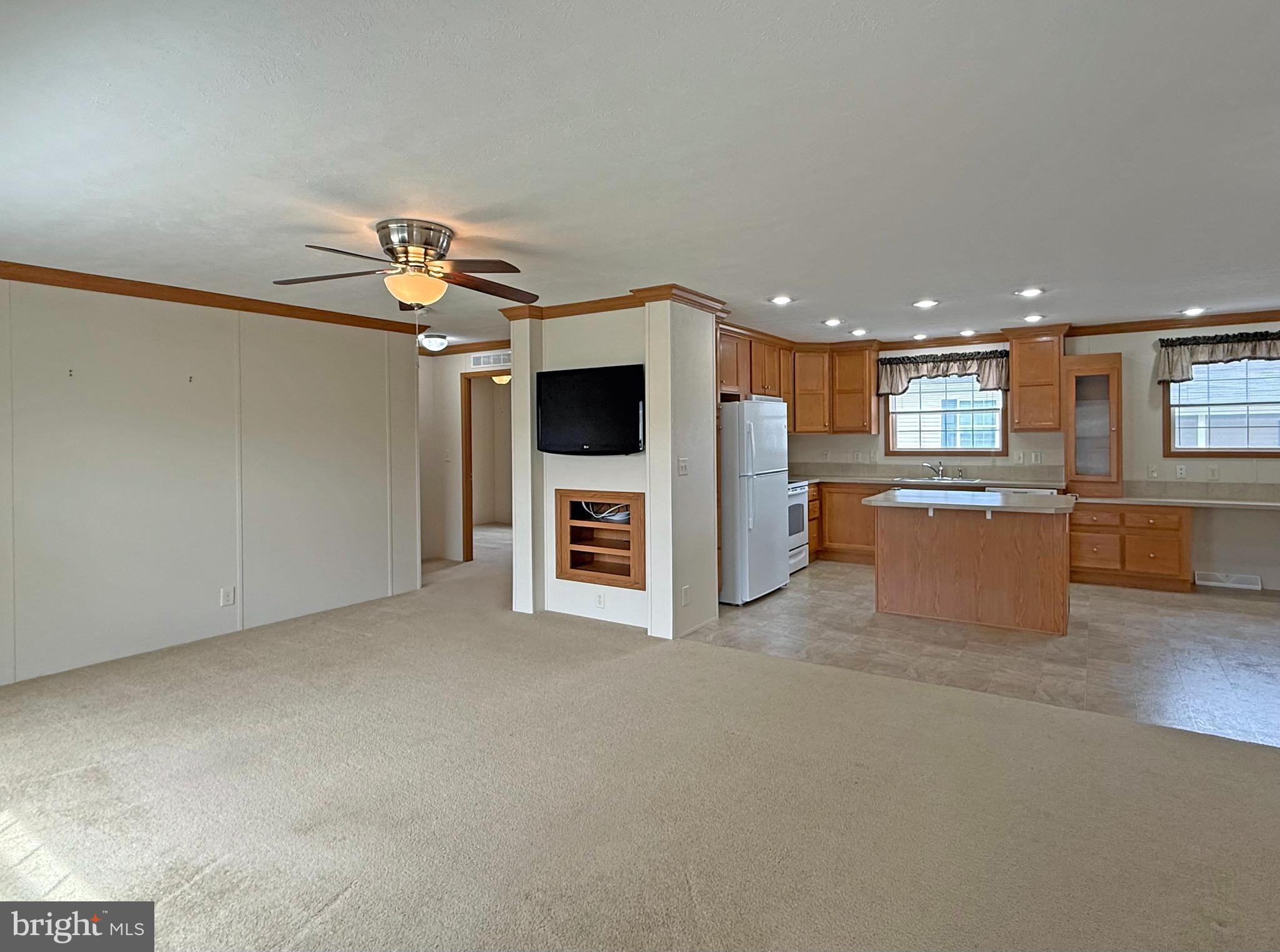 25 Baybreeze Road, Unit C29 Rehoboth Beach, DE 19971 - Photo 36 of 36 a view of a kitchen with a microwave and a stove