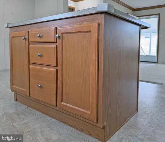 a view of cabinets and window
