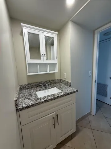 a bathroom with a glass shower